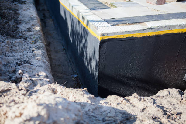 Professional Basement Waterproofing technician working in La Rue, OH